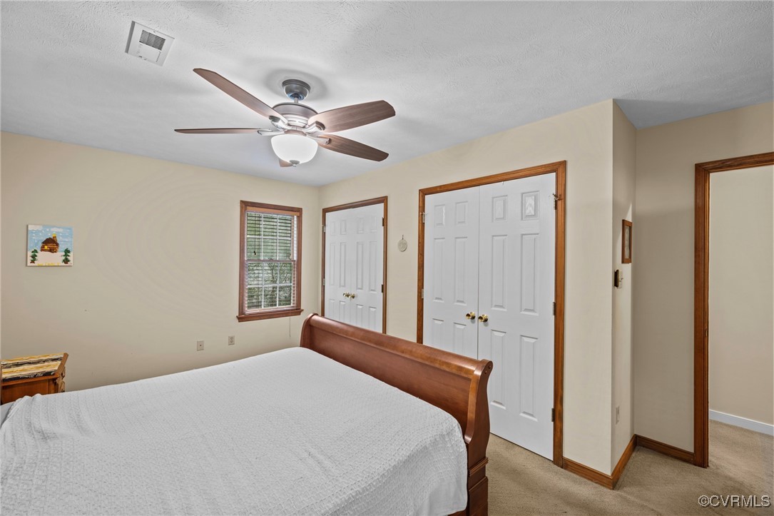 6137 Dijon Drive Mechanicsville, VA 23111 - Photo 16 of 44 a bedroom with a bed and window