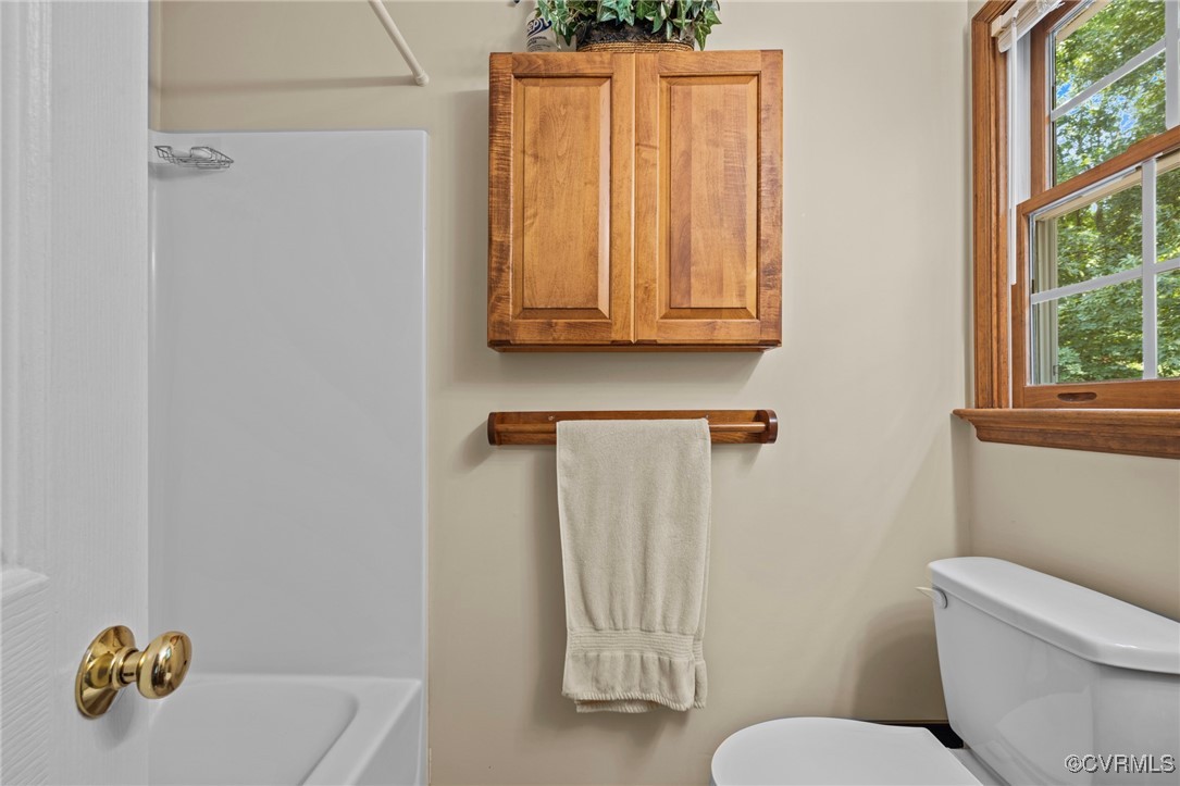 6137 Dijon Drive Mechanicsville, VA 23111 - Photo 21 of 44 a bathroom with a toilet sink and tub