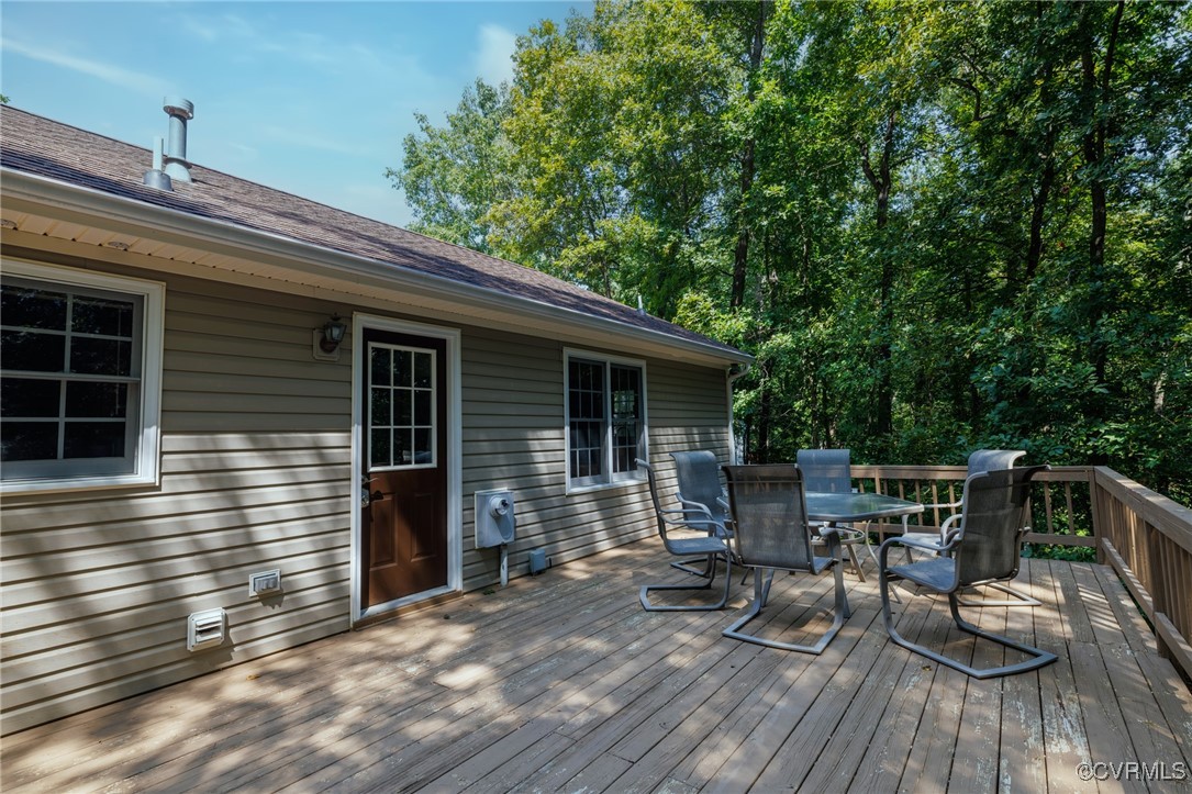 6137 Dijon Drive Mechanicsville, VA 23111 - Photo 33 of 44 a view of house with deck outdoor seating and yard