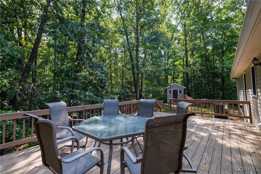 6137 Dijon Drive Mechanicsville, VA 23111 - Photo 35 of 44 a view of a dinning table and chairs on the roof deck