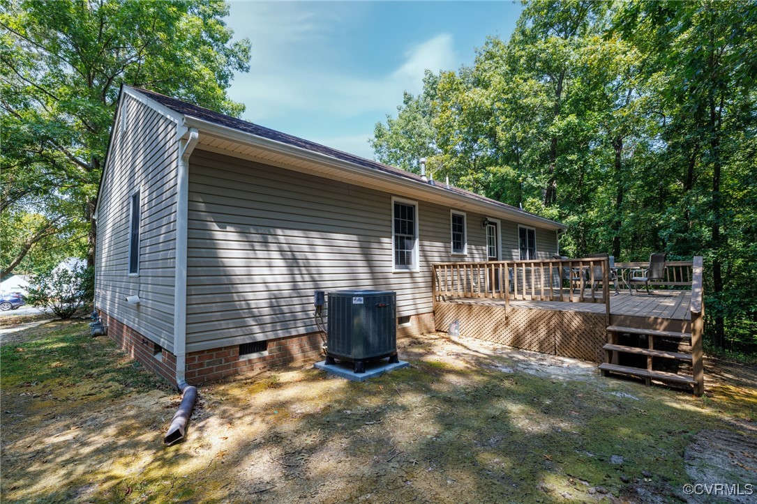 6137 Dijon Drive Mechanicsville, VA 23111 - Photo 37 of 44 a view of backyard with deck and outdoor seating