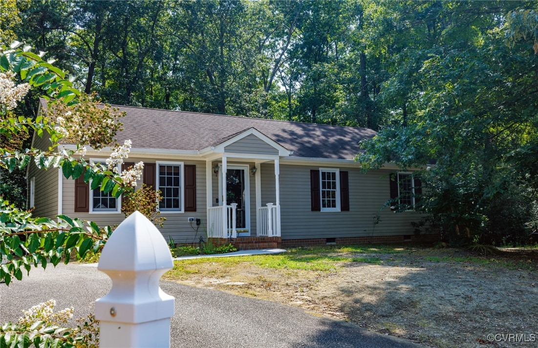 6137 Dijon Drive Mechanicsville, VA 23111 - Photo 4 of 44 front view of house with a yard