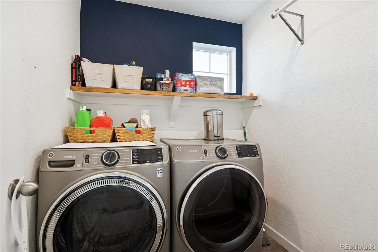 3530 Sawtooth Street Frederick, CO 80516 - Photo 22 of 36 a utility room with dryer and washer