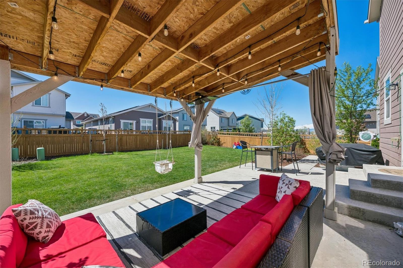 3530 Sawtooth Street Frederick, CO 80516 - Photo 23 of 36 a view of a backyard with sitting area