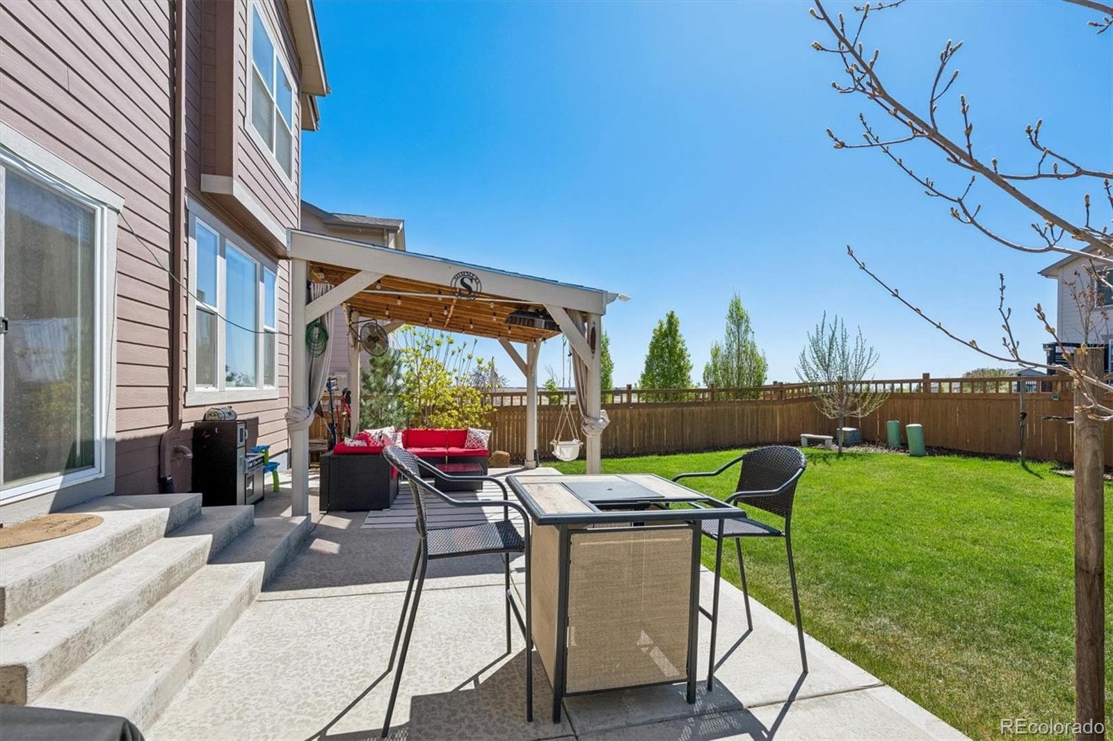 3530 Sawtooth Street Frederick, CO 80516 - Photo 24 of 36 a view of an chairs and table in patio