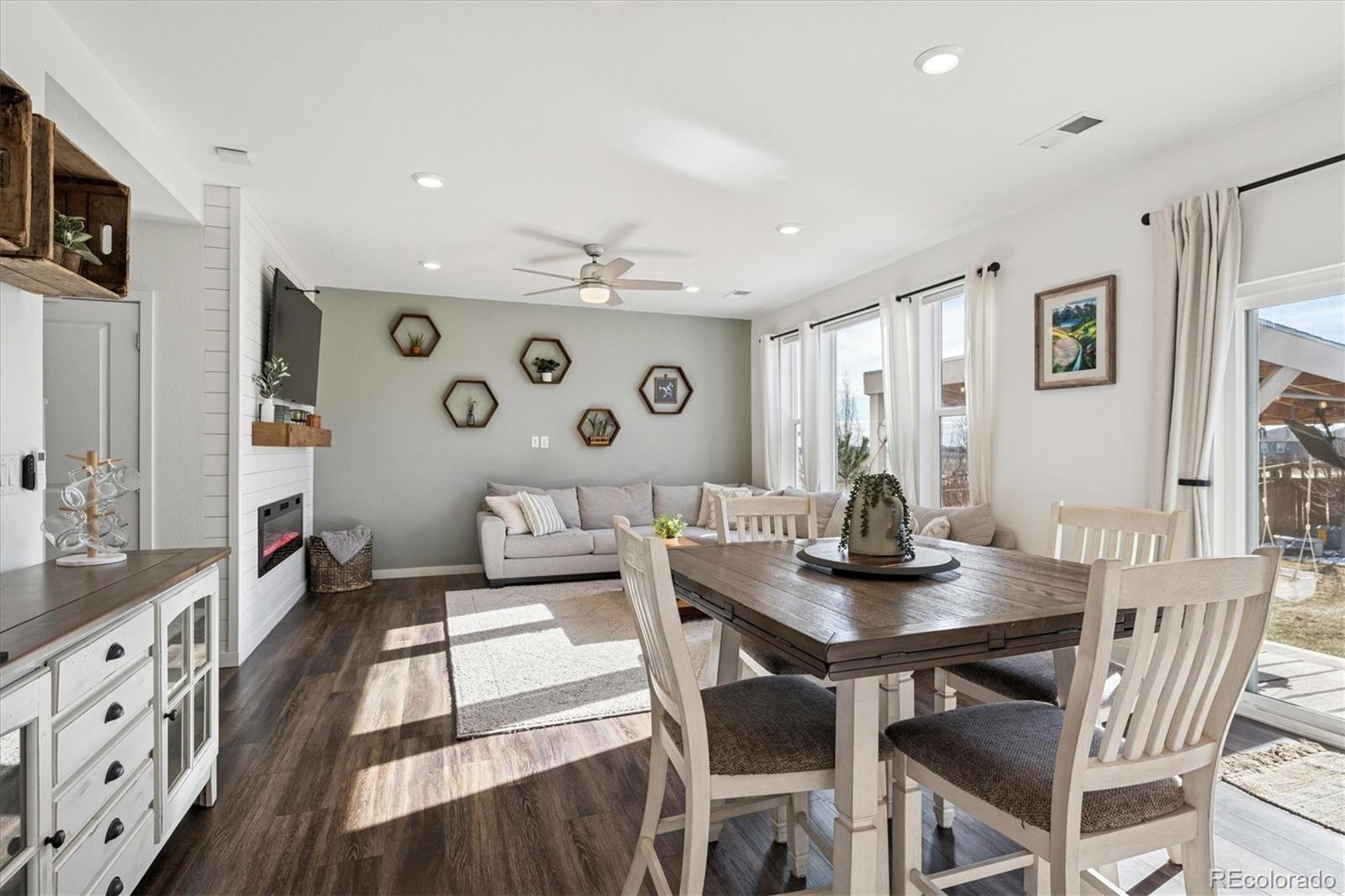 3530 Sawtooth Street Frederick, CO 80516 - Photo 7 of 36 a view of a dining room with furniture and wooden floor