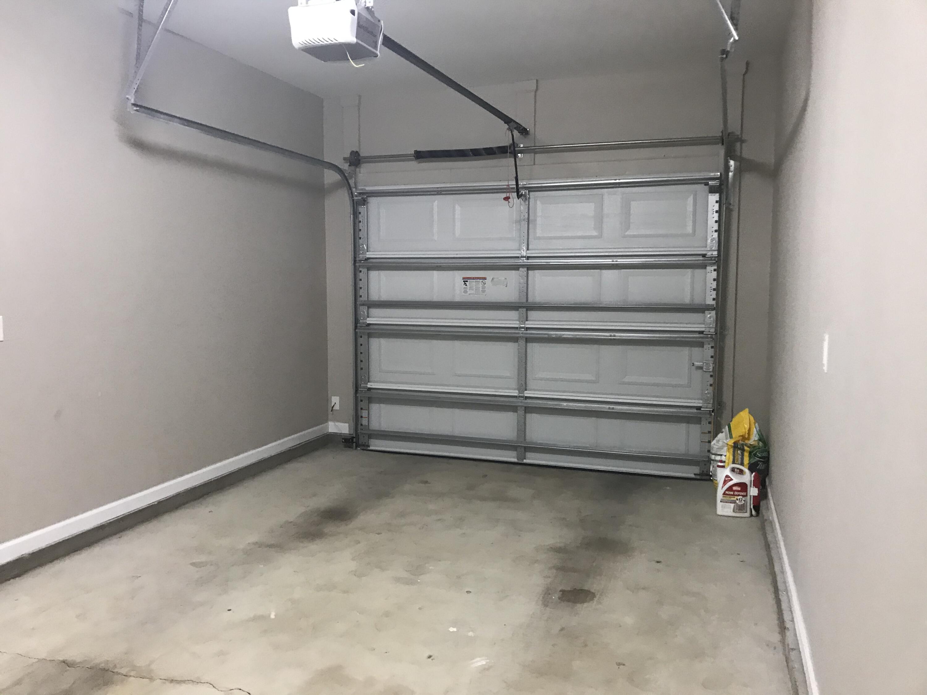 240 Dixie Street Crestview, FL 32536 - Photo 18 of 20 a view of room with racks on the wall