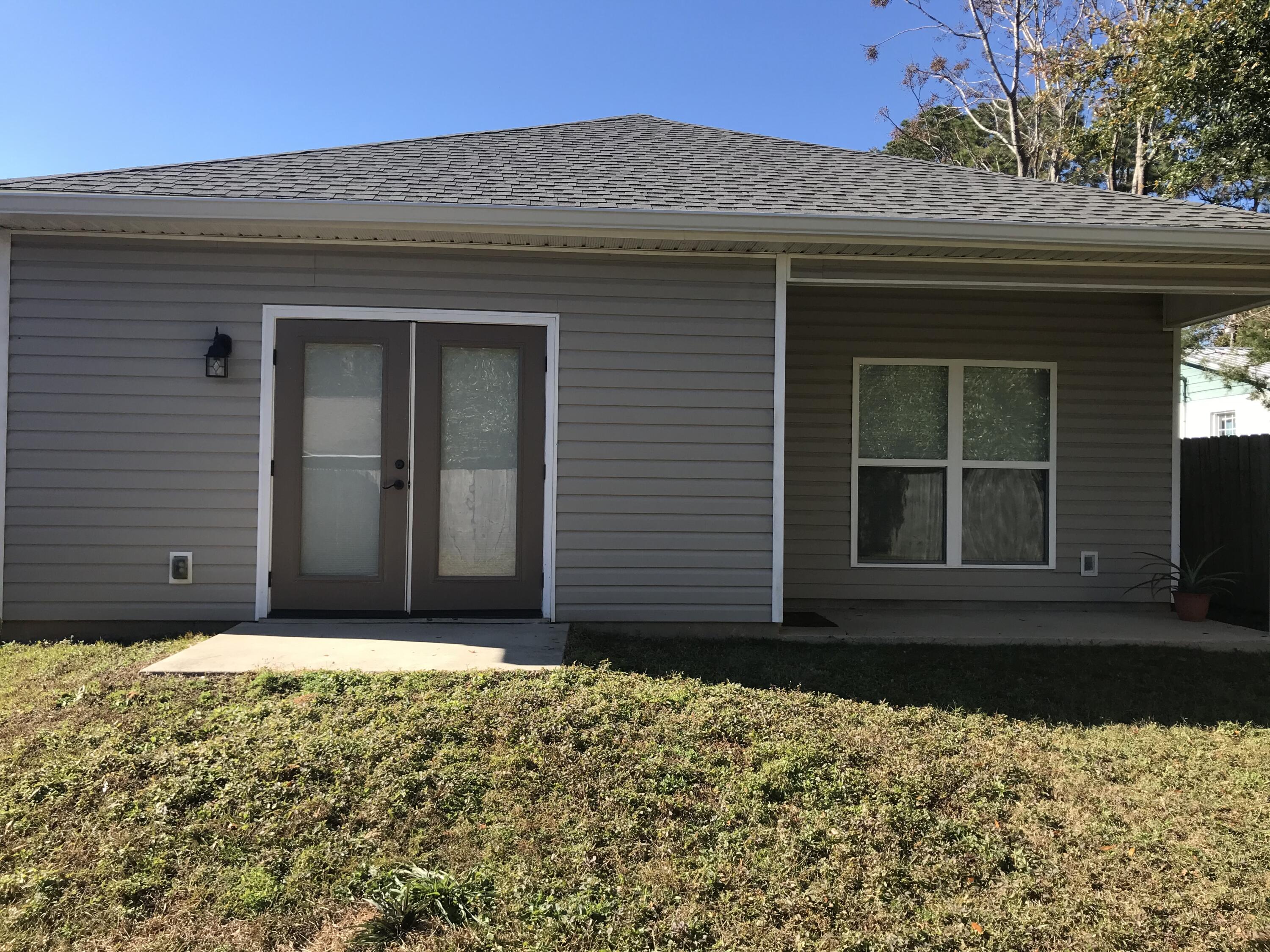 240 Dixie Street Crestview, FL 32536 - Photo 19 of 20 a front view of a house