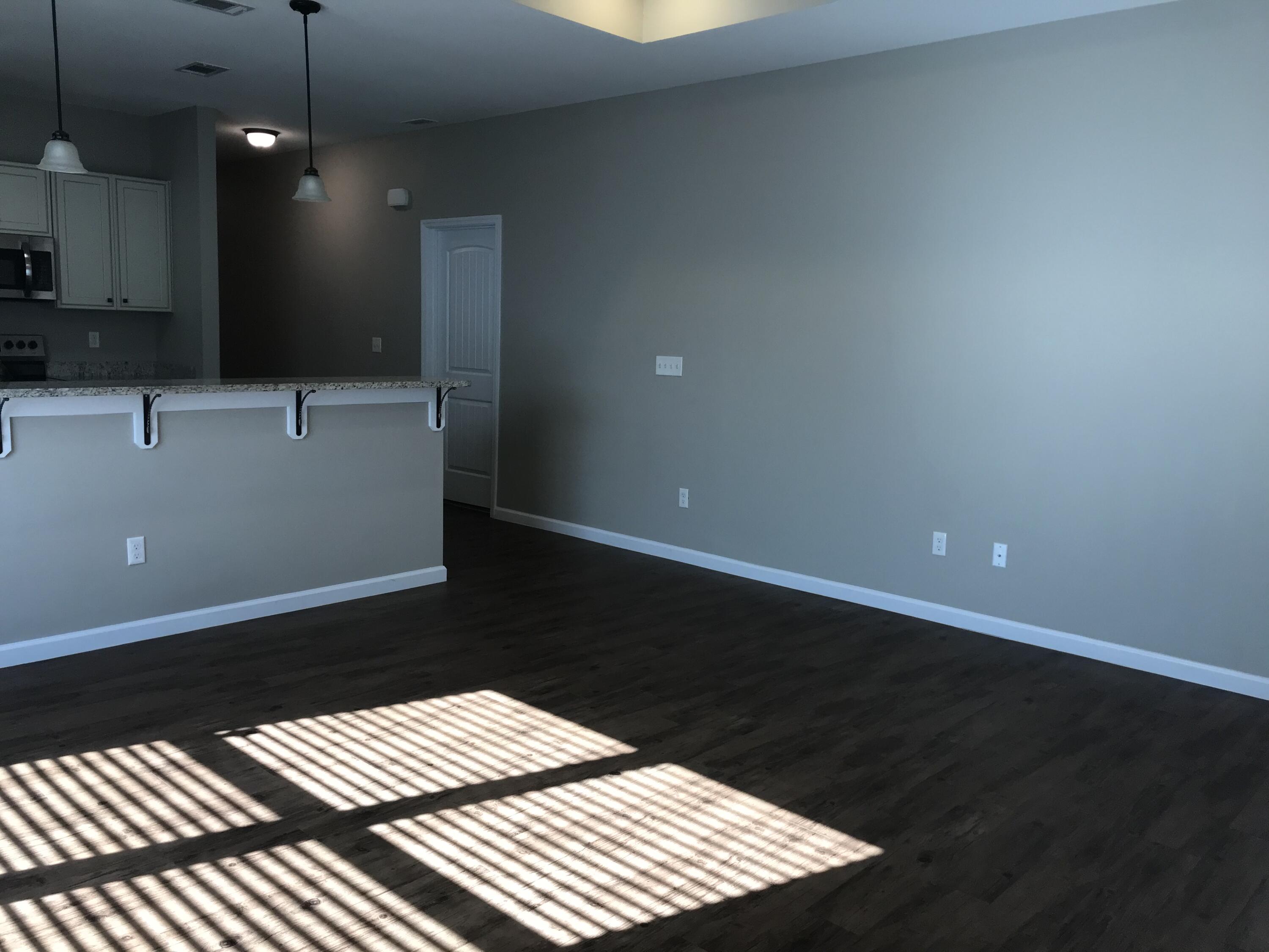 240 Dixie Street Crestview, FL 32536 - Photo 8 of 20 a bathroom with a sink and a mirror