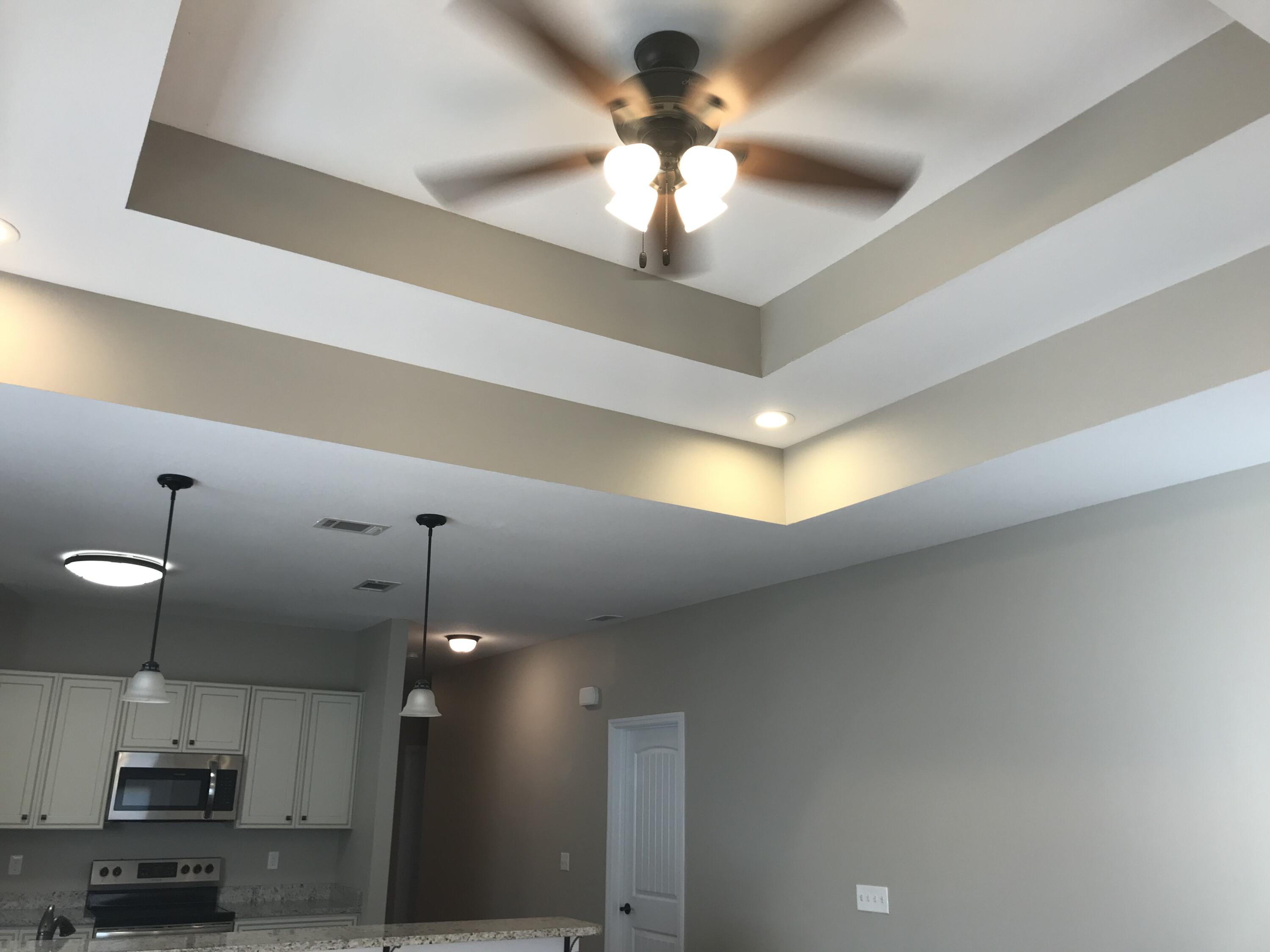 240 Dixie Street Crestview, FL 32536 - Photo 9 of 20 a view of a lobby with chandelier fan and windows