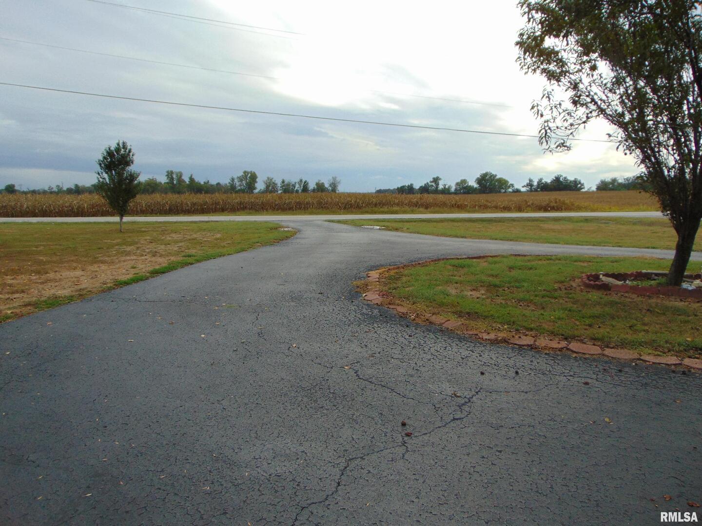 4077 Highway 154 Pinckneyville, IL 62274 - Photo 10 of 10 a view of a lake with a big yard