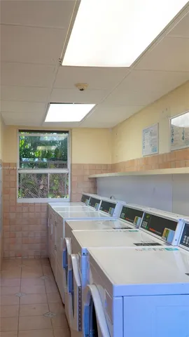 a kitchen with a sink and a window