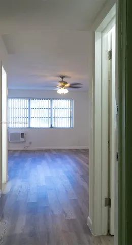 a view of an empty room and window