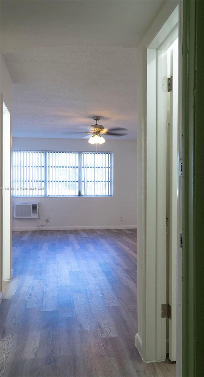 5990 Northeast 18th Avenue, Unit 505 Fort Lauderdale, FL 33334 - Photo 6 of 14 a view of an empty room and window