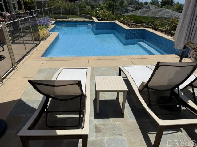 542 Hidden Ridge Court Encinitas, CA 92024 - Photo 1 of 3 a view of a chairs and table in the balcony