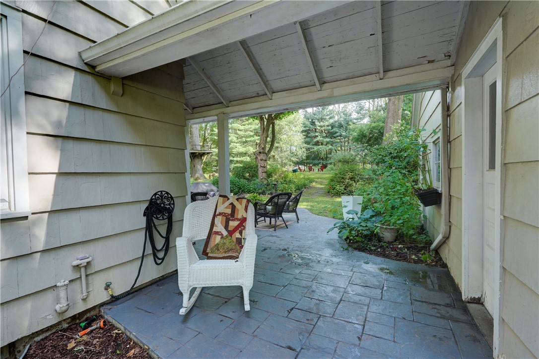 157 Ayrault Road Perinton, NY 14450 - Photo 27 of 37 Walkway between house and garage