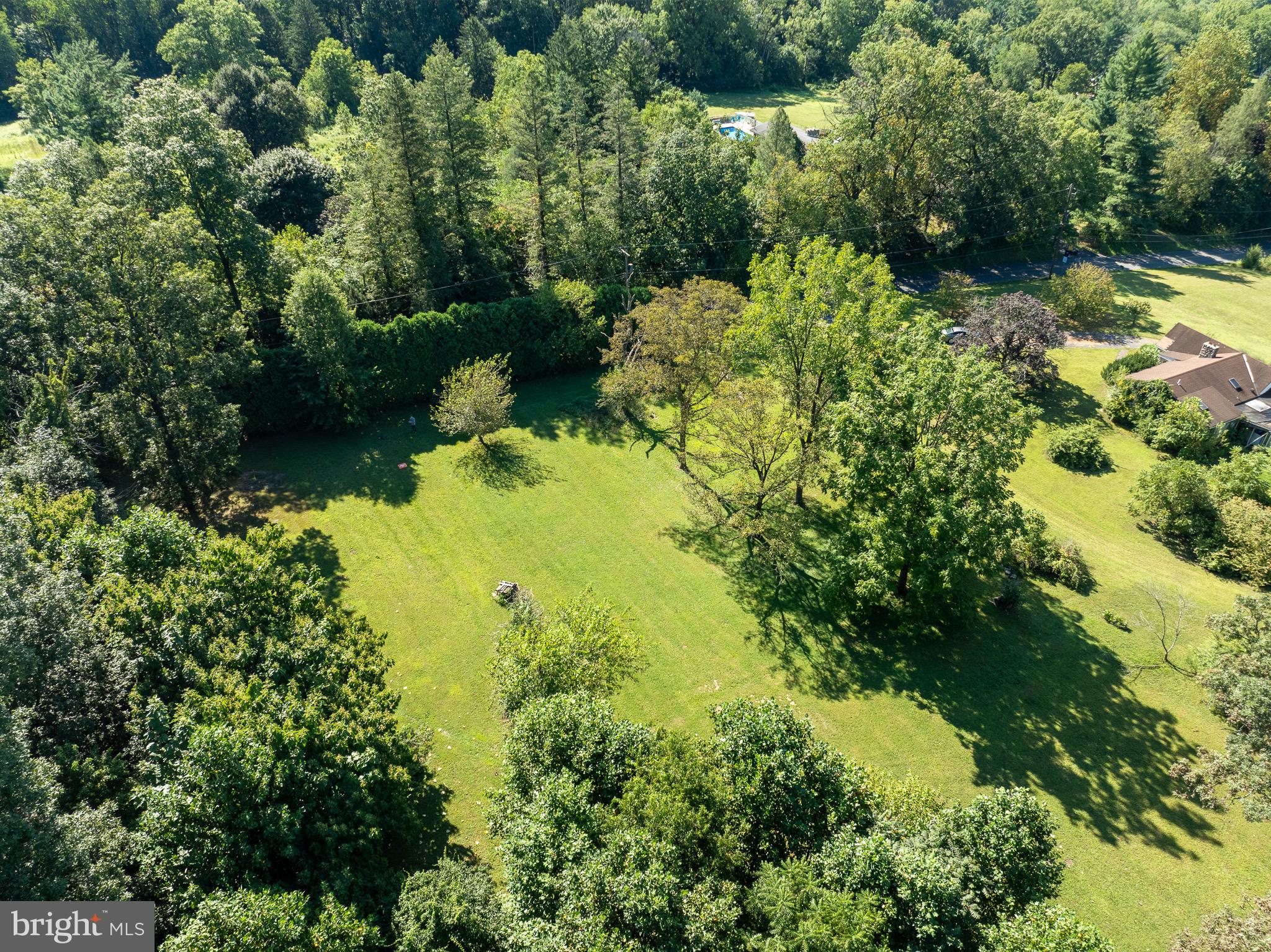 3251 Coventryville Road Pottstown, PA 19465 - Photo 4 of 11 an aerial view of residential house with swimming pool and green space