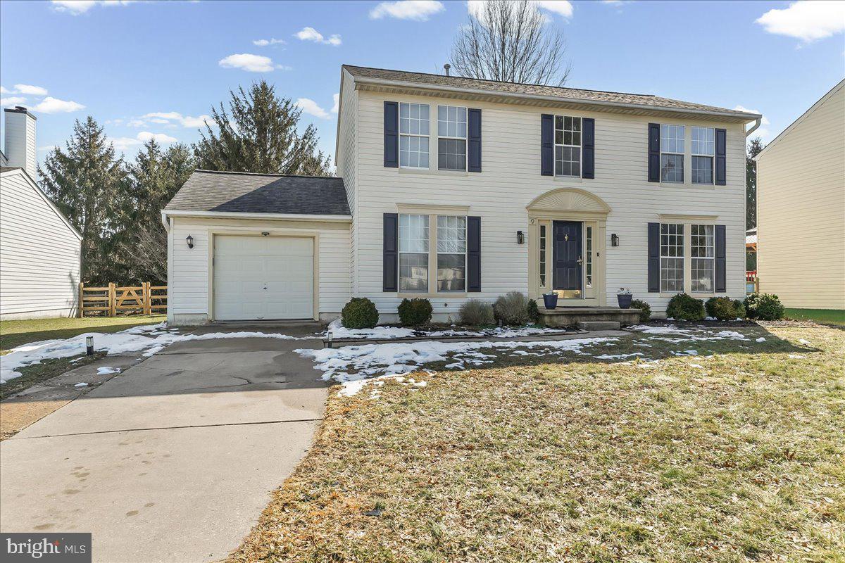 9 Corralberry Road Newark, DE 19702 - Photo 2 of 37 a front view of a house with a yard