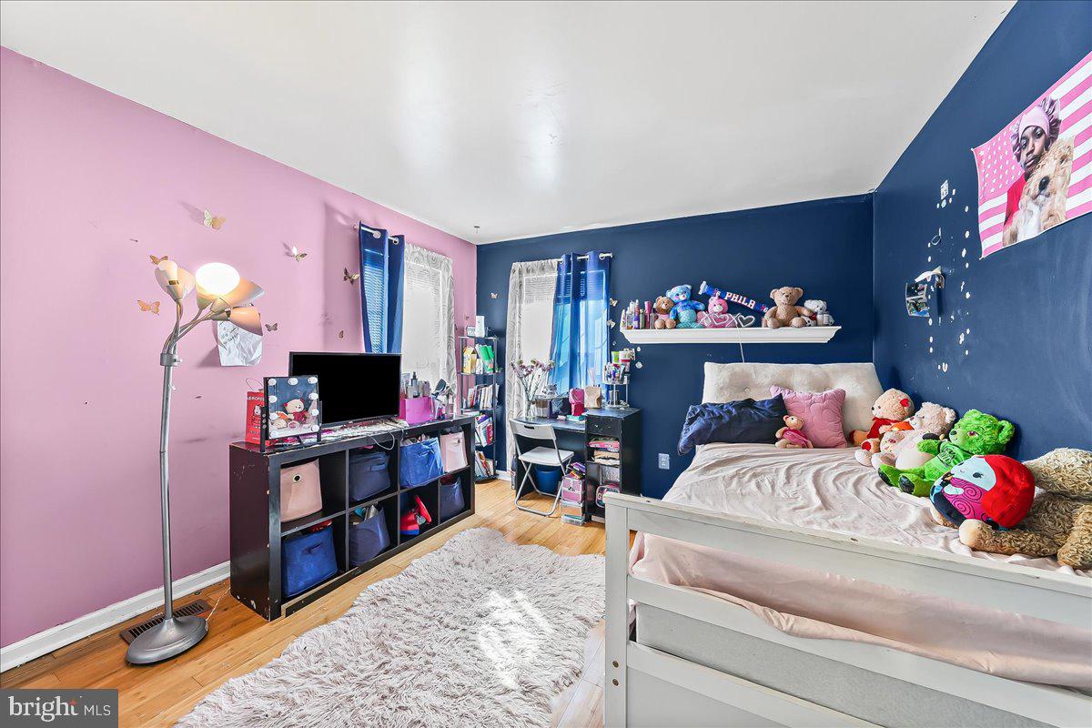 9 Corralberry Road Newark, DE 19702 - Photo 22 of 37 a bedroom with a bed and a flat screen tv