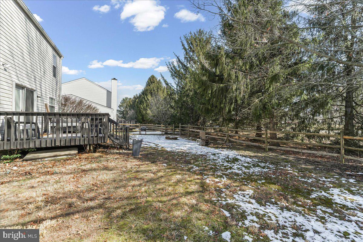 9 Corralberry Road Newark, DE 19702 - Photo 35 of 37 a view of backyard with large trees