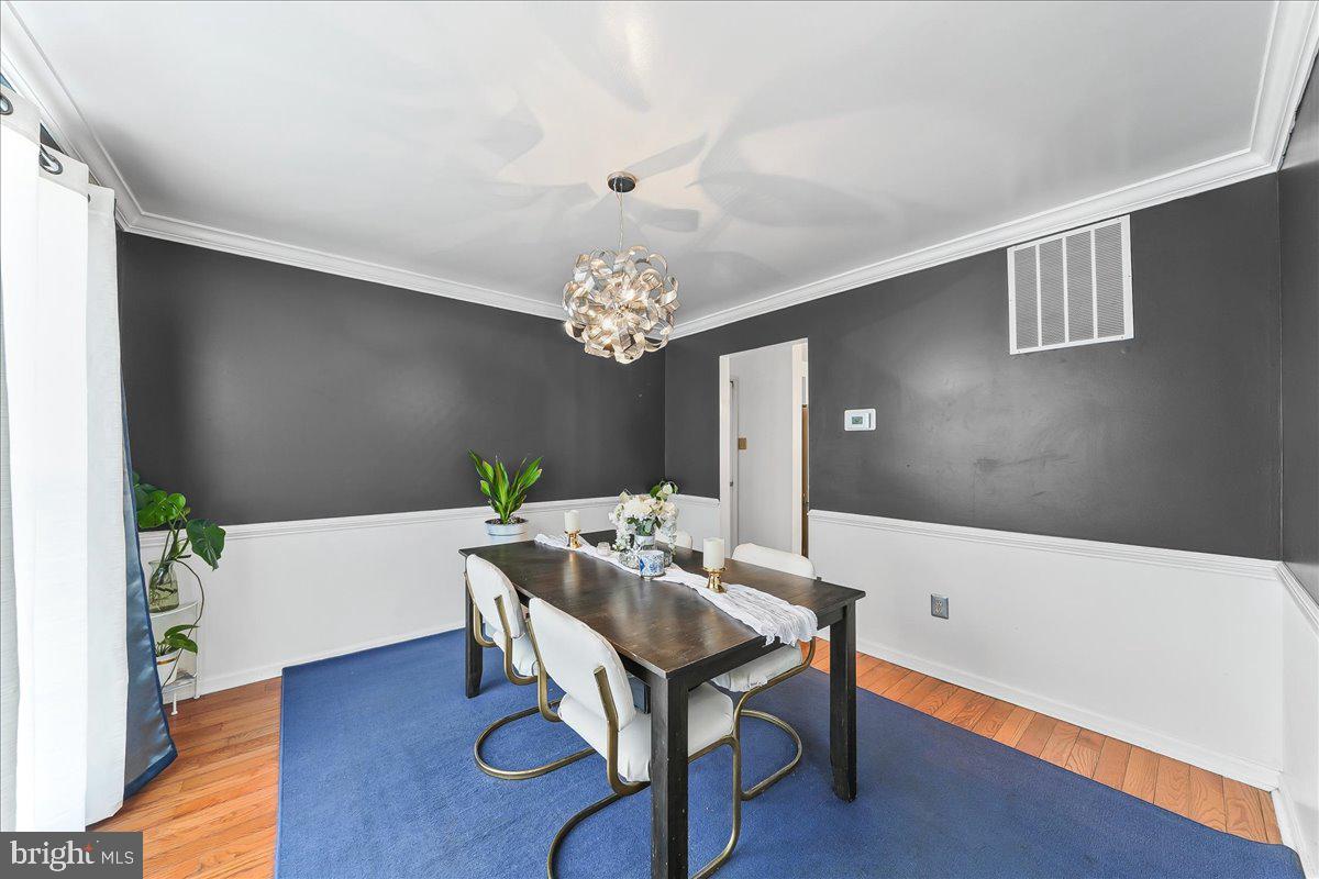 9 Corralberry Road Newark, DE 19702 - Photo 4 of 37 a view of a dining room with furniture and wooden floor