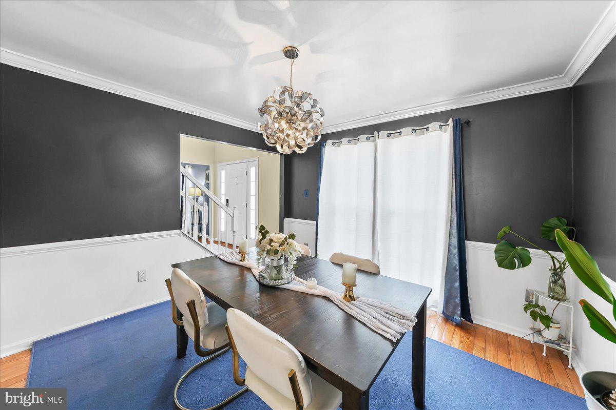 9 Corralberry Road Newark, DE 19702 - Photo 5 of 37 a view of a dining room with furniture and wooden floor