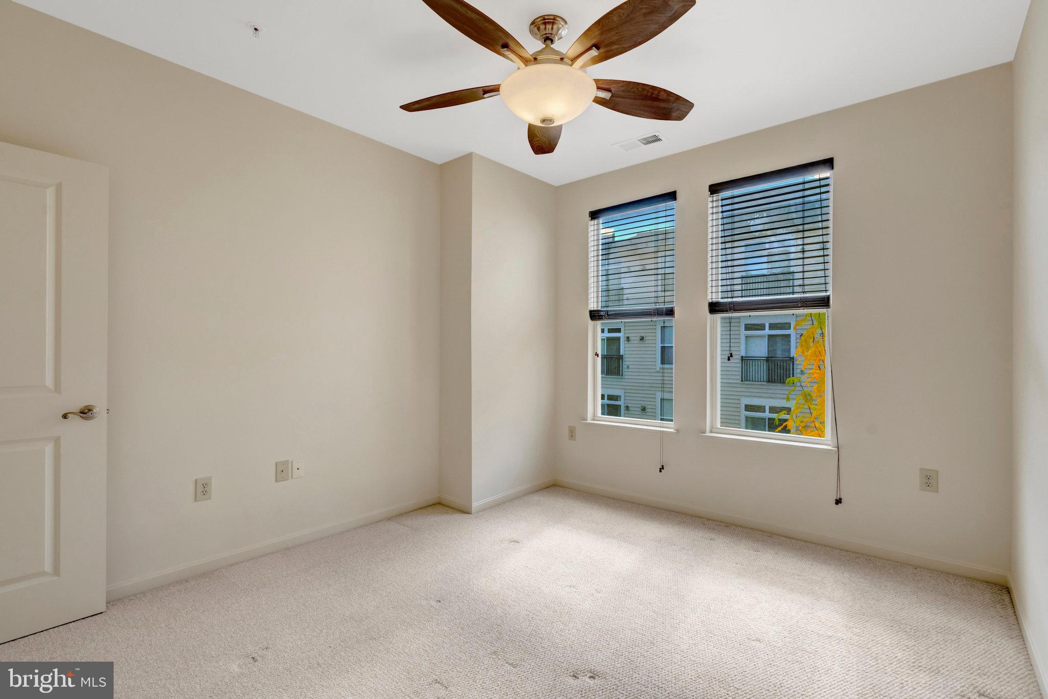 2665 Prosperity Avenue, Unit 345 Fairfax, VA 22031 - Photo 14 of 33 a view of an empty room with a window