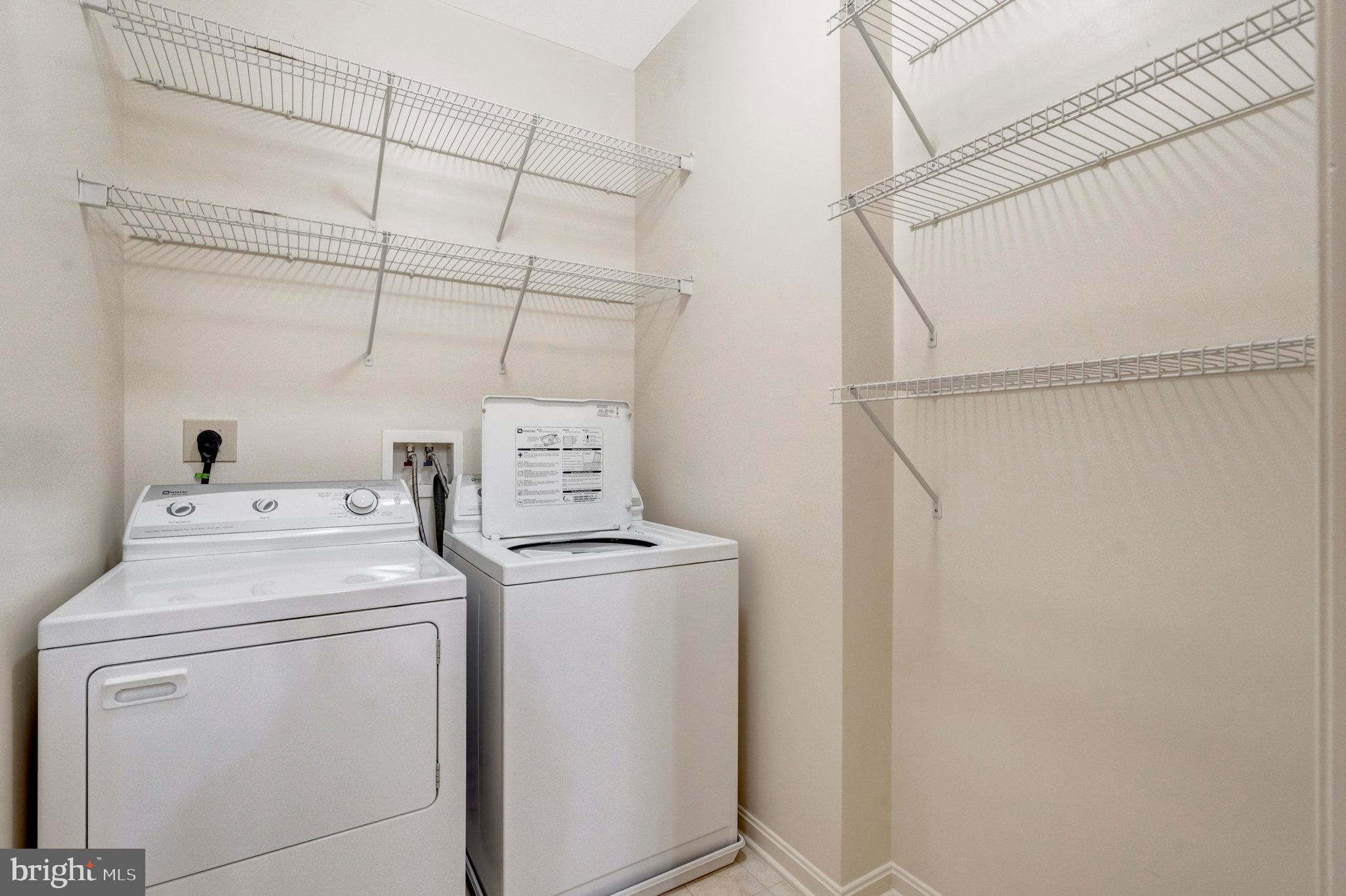 2665 Prosperity Avenue, Unit 345 Fairfax, VA 22031 - Photo 17 of 33 a utility room with dryer and washer
