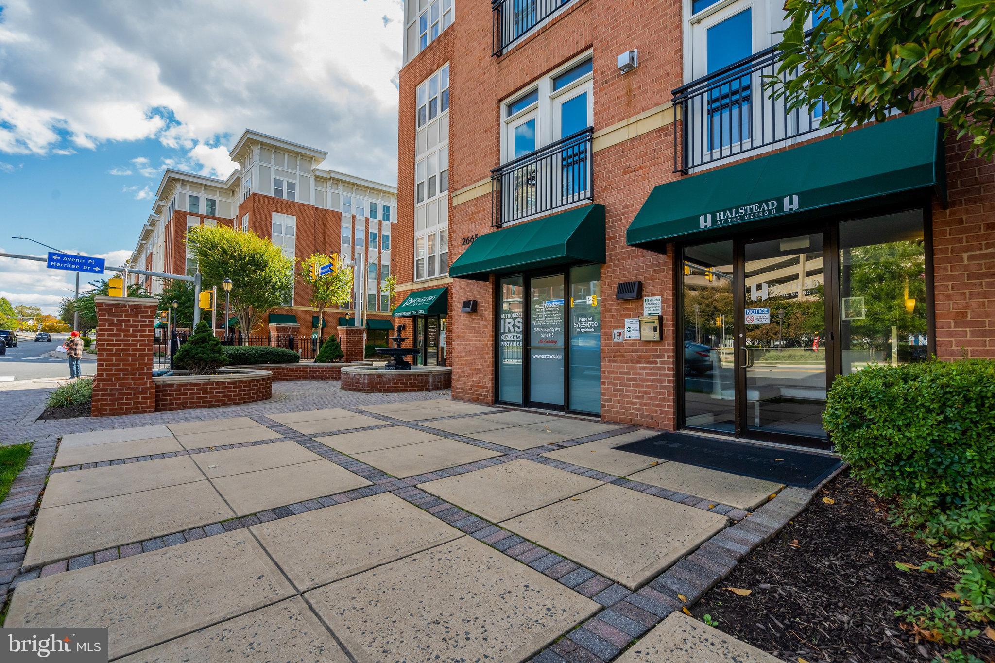 2665 Prosperity Avenue, Unit 345 Fairfax, VA 22031 - Photo 23 of 33 a view of a building with a street