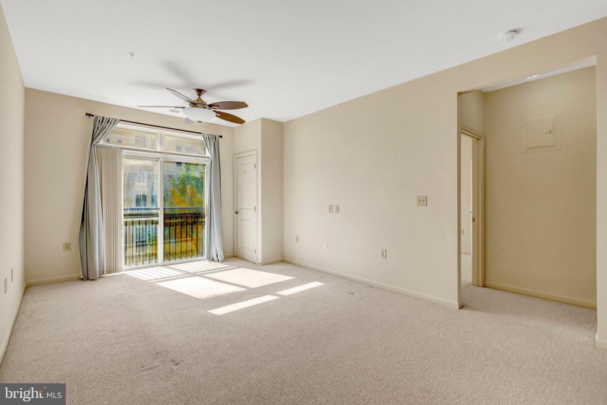 2665 Prosperity Avenue, Unit 345 Fairfax, VA 22031 - Photo 9 of 33 a view of an empty room with a window