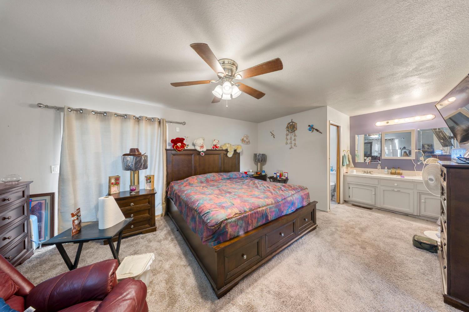 2779 Story Avenue Merced, CA 95340 - Photo 18 of 27 a living room with furniture and kitchen view