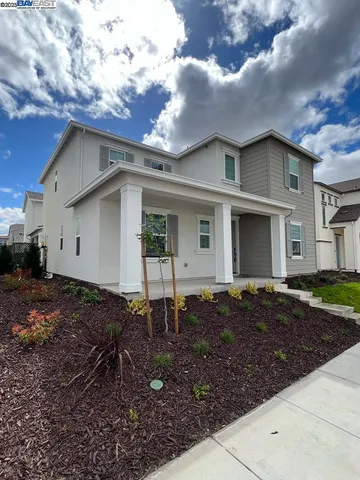 a house view with a backyard space