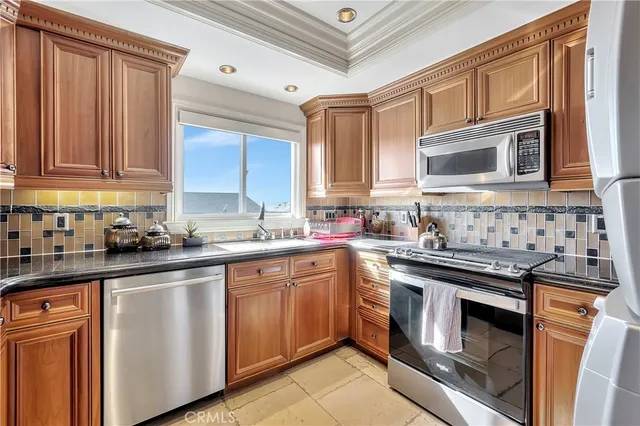 a living room with fireplace furniture and a fireplace