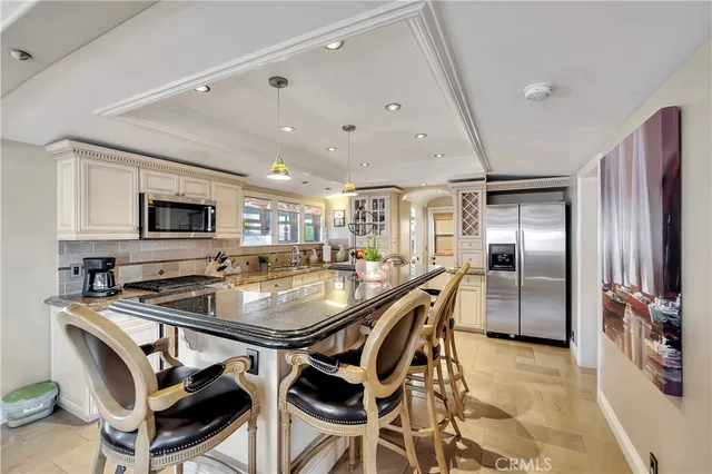 a view of a dining area with furniture and window