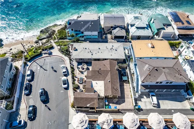 a view of a street with an ocean view