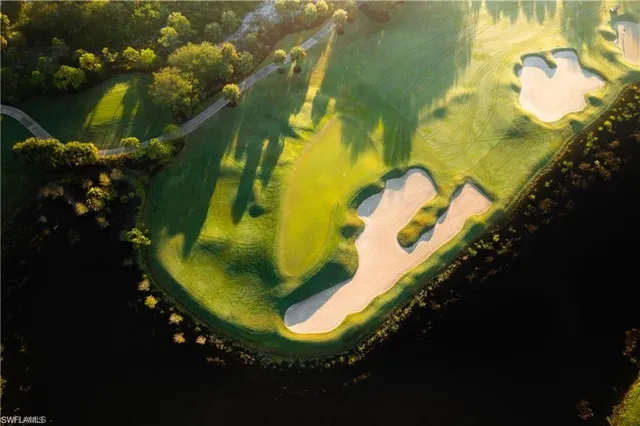 a view of a swimming pool with a lake view