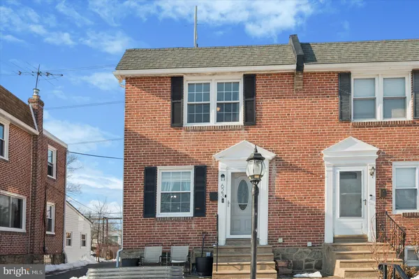 a front view of a building with a street