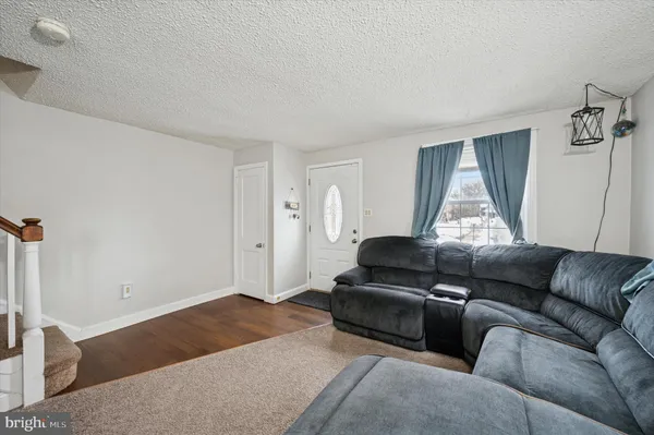 a living room with furniture and a couch