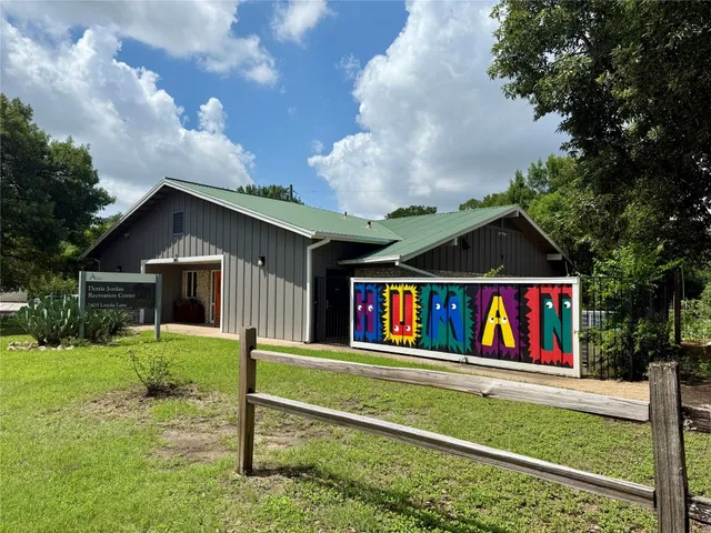 a house with swimming pool and porch