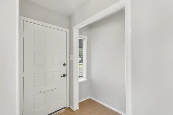 a view of small space with wooden floor