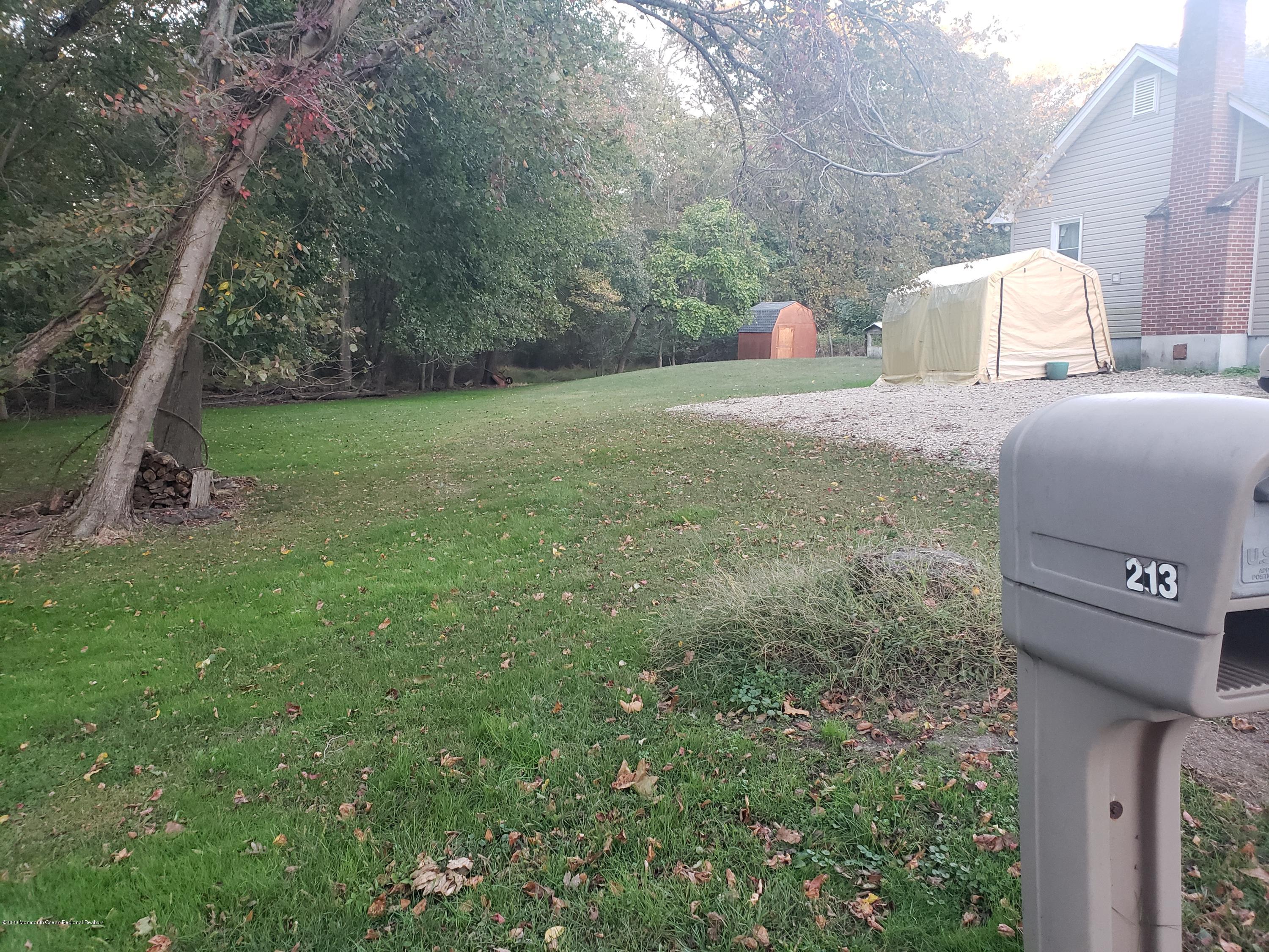 213 Maxim Road Howell, NJ 07731 - Photo 18 of 19 Side of House with Yard 2