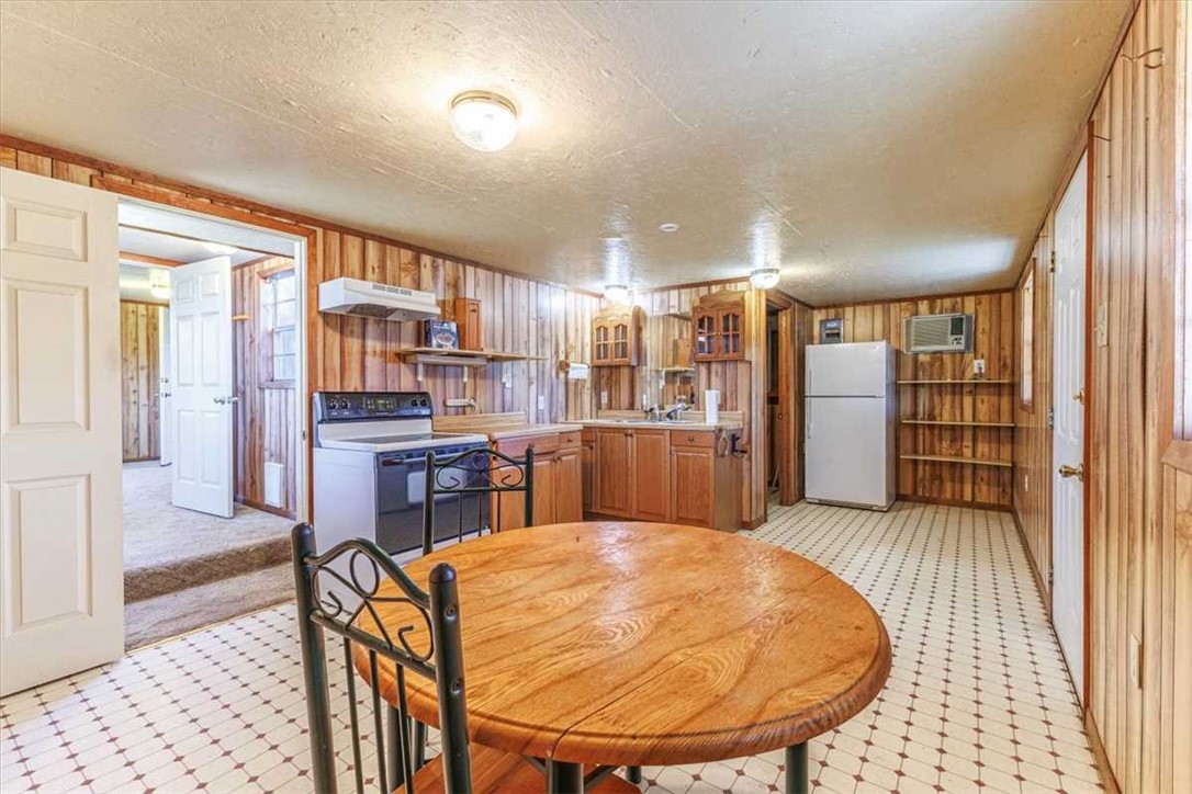 2998 Straws Mill Road Gatesville, TX 76528 - Photo 62 of 77 a living room with stainless steel appliances furniture a rug and a kitchen view