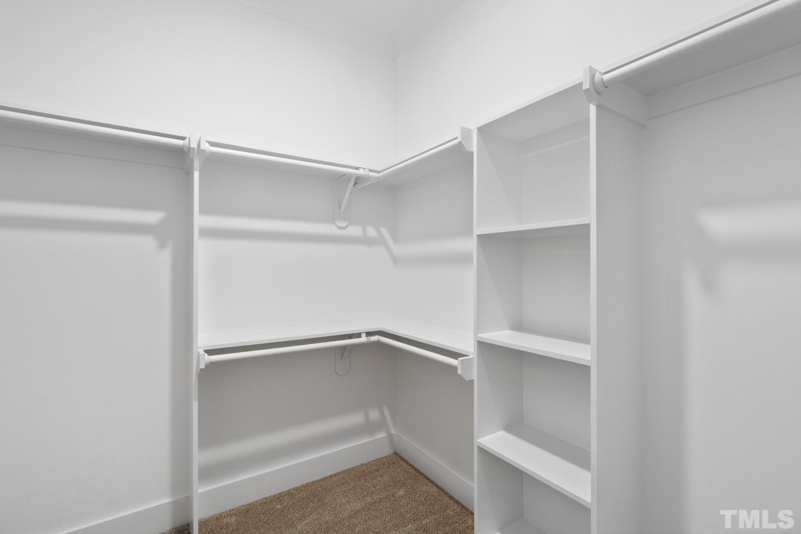 6118 Fox Road Raleigh, NC 27616 - Photo 18 of 32 a view of an empty walk in closet