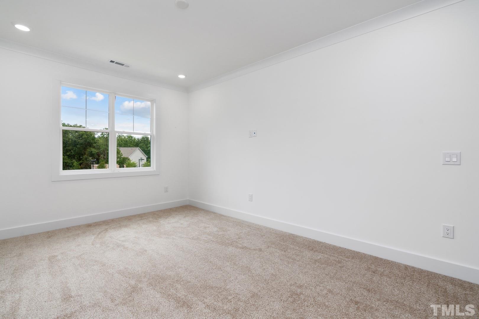 6118 Fox Road Raleigh, NC 27616 - Photo 23 of 32 an empty room with windows