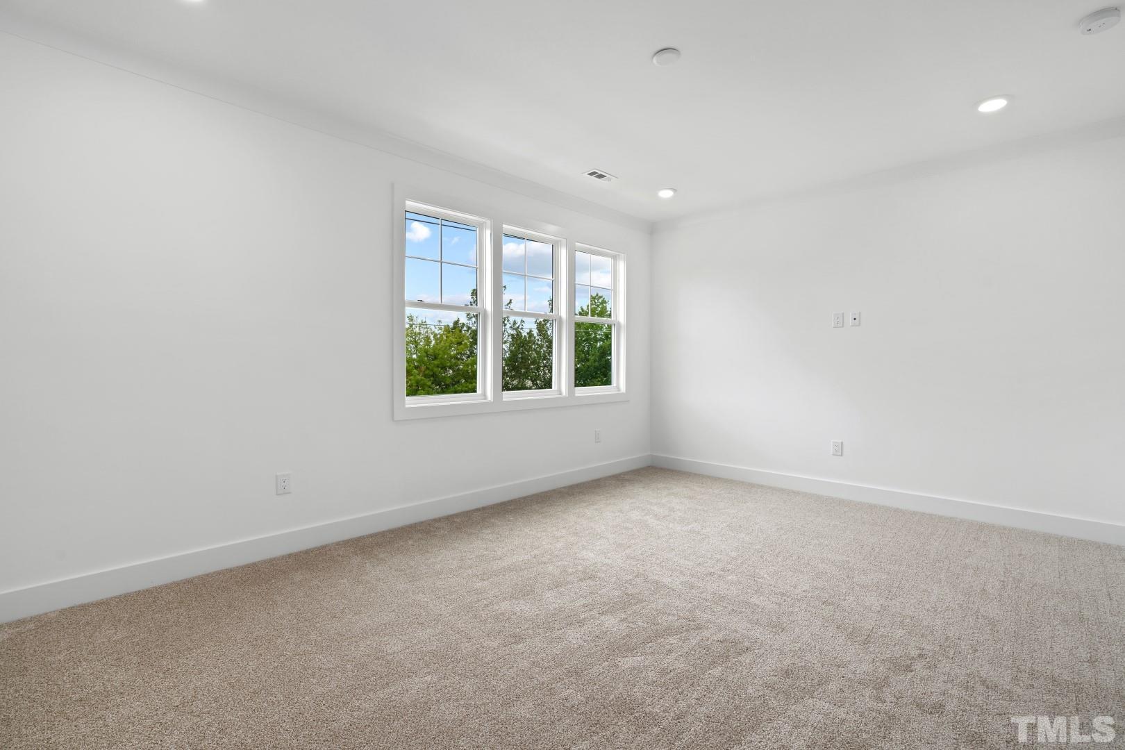 6118 Fox Road Raleigh, NC 27616 - Photo 29 of 32 an empty room with windows