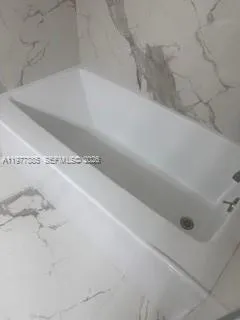a close up of a bathtub