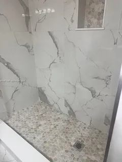 a view of a dry yard in the bathroom