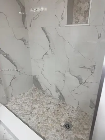 a view of a dry yard in the bathroom