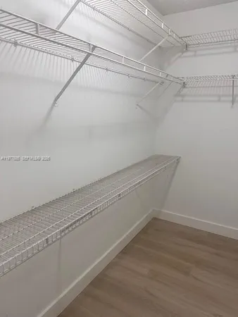 a view of a room with racks on the wall