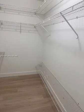 a view of a room with racks on the wall